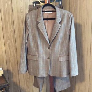 Tahari women suit. 16 Tan and brown plaid with patches on blazer sleeves.